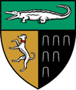 Yale Law School coat of arms, with figures of a crocodile and a greyhound.